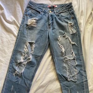 Ripped destressed boyfriend jeans